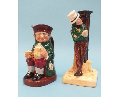 A Royal Doulton 'Old Charley' toby jug and a Bretby table lamp of a man leaning against a lamp post (2)
