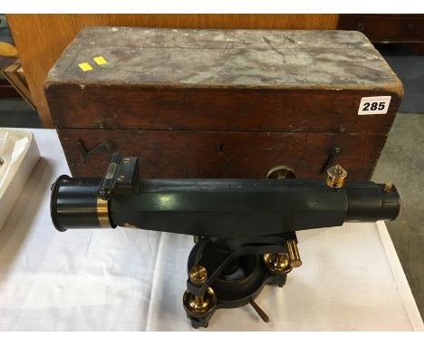 A Stanley  of London Surveyors level, tripod and measure