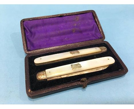 Cased mother of pearl handled silver knife and fork