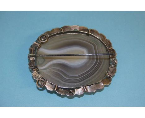 A silver bracelet, silver bangle, silver charm and a large agate set oval brooch