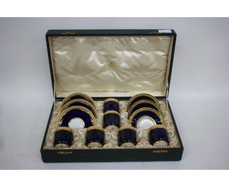 A PASTE SPODE COFFEE SET with blue ground cups, three matching saucers and three further associated saucers 