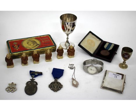 A SILVER CIGARETTE CASE together with two silver Masonic medals, a 1936 Berlin Olympic badge, a Victorian South Africa Campai