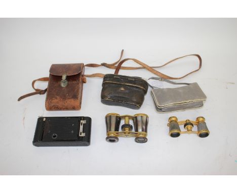A KODAK MODEL B VEST POCKET CAMERA with leather case; a pair of mother of pearl mounted opera glasses with leather case and a