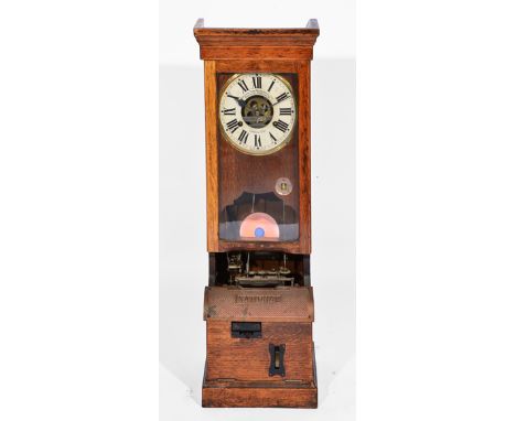 A NATIONAL TIME RECORDER CO LIMITED CLOCKING IN/OUT WALL CLOCK with oak case, white painted chapter ring with black Roman num