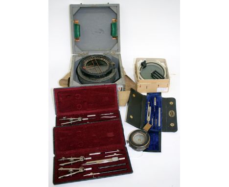 A 1940 MARK III BRITISH MILIARY MAGNETIC MARCHING COMPASS, serial number B23526 together with a WWII RAF type P8 flying compa