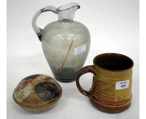 A ST IVES LEACH POTTERY ASH GLAZED TANKARD, the handle with impressed mark beneath, 12cm high together with an art pottery bo