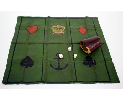 AN OLD GAMBLING GAME the canvas board divided into six sections with an anchor, a crown, an ace, a spade, a club and a heart 