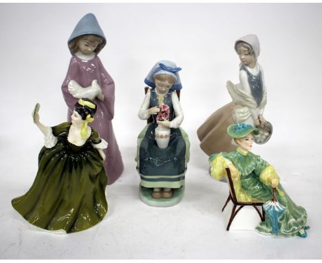 A LLADRO FIGURE together with a Nao porcelain figure of a girl holding a basket, two Royal Doulton figures and a further porc