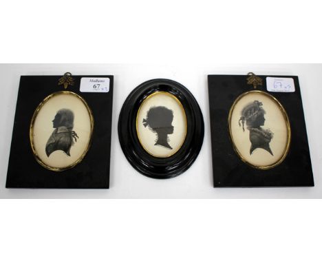 A PAIR OF SILHOUETTES OF A GENTLEMAN AND A LADY, each signed 'Turville', 9.5cm x 7.5cm (oval) together with a further oval si