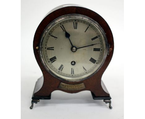 A MAHOGANY CASED MANTLE TIMEPIECE OR CLOCK, circular silvered dial with Roman numerals signed 'Pearce, Leeds' and standing on