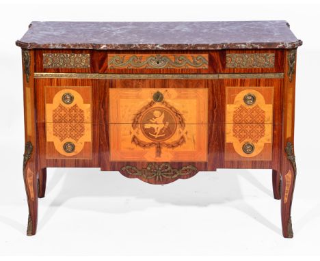 A MARBLE TOPPED ITALIANATE COMMODE CHEST, the graduated long drawers with gilt metal mounts, marquetry inlaid decoration and 