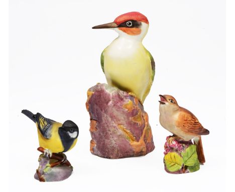 A ROYAL WORCESTER BONE CHINA FIGURINE OF A GREEN WOODPECKER, number 3249 together with a Royal Worcester great tit, number 33