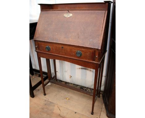 AN ART NOUVEAU WALNUT BUREAU with a galleried top, the fall front with mother-of-pearl and marquetry inlay, cedar lined inter