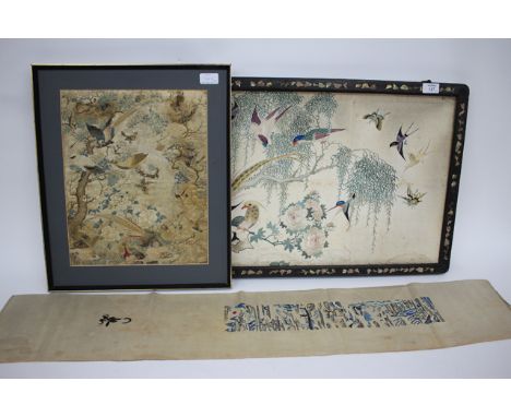 A CHINESE EMBROIDERED SILK PANEL with parrots and hummingbirds within a tree and all housed within a hardwood mother-of-pearl