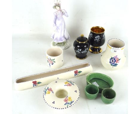 An assortment of ceramics. To include Poole pottery. Royal Worcester walking out dresses of the 19th century figure, etc
