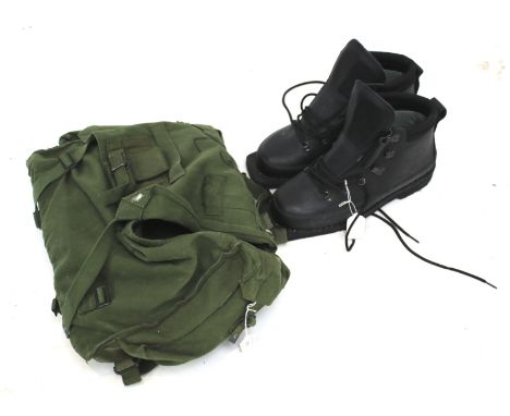 A pair of Army issue boots by Alico. Together with military webbing in bagBoots and set of military webbing