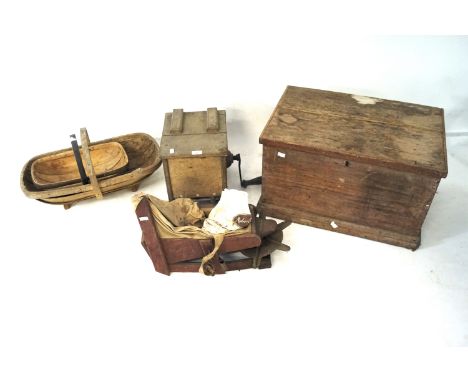 A 19th century pine trunk, two vintage trugs, butter maker and a flower sifter.