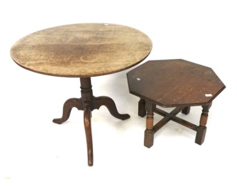 A small oak round table on tripod support and a coffee table. The table measuring 80cm in diameter, the coffee table of octag