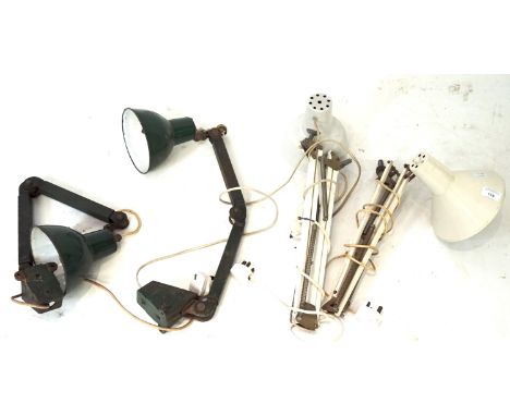 An assortment of four anglepoise work bench lamps. Some with enamel shades