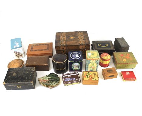 An assortment vintage wooden boxes and collectors tins.