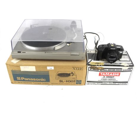 A Panasonic Sl-H302 record player and a Tamashi 35mm camera. Both boxed. 