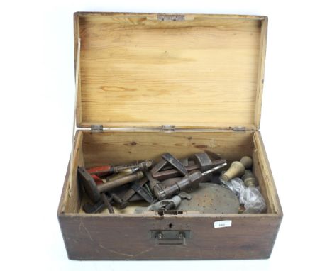 A 19th century pitch pine workman's trunk. Complete with an assortment of vintage braces and tools.