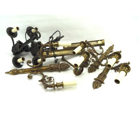 A selection of ceiling and wall lights. Including a set of six gilt sconces and a three branch ceiling light