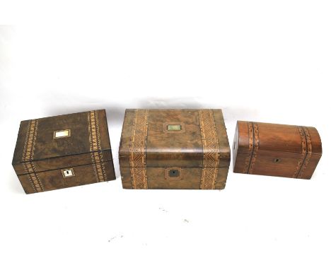 Three late 19th century walnut and mahogany inlaid wooden boxes. Two converted to sewing boxes, the other a two-compartment t