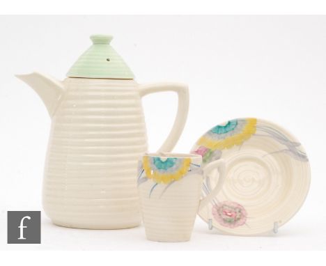 A Clarice Cliff Lynton shape coffee cup and saucer decorated in the Aurea pattern, printed script Wilkinson mark, saucer diam