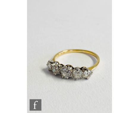 A mid 20th Century 18ct diamond five stone ring, claw set old cut stones to knife edged shoulders, weight 1.8g, ring size I 1