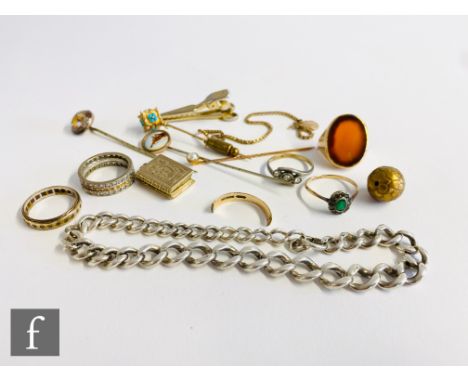 A small parcel lot of assorted jewellery to include a broken 9ct signet ring, three stick pins, a silver bracelet etc. 