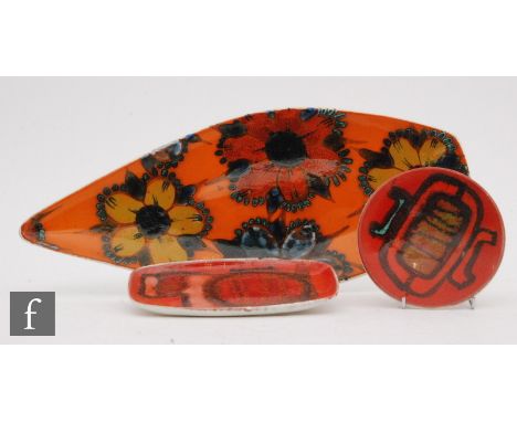 A Poole Pottery shape 82 spear shaped dish decorated with flower heads, printed mark, length 43cm, together with a shape 49 p