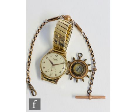 A gentleman's 9ct Trebex wrist watch, Arabic numerals to a circular cream dial, all to an expanding bracelet, with a part 9ct