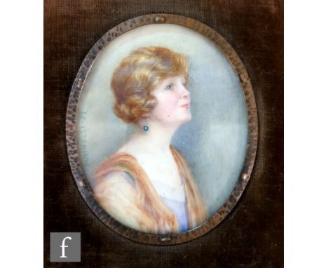 DORIS PUSINELLI, RI (1900-1976) - Portrait of a Lady, miniature on ivory, signed and dated '23, oval, within a leather case, 