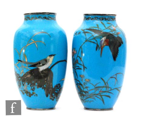 A pair of Chinese cloisonne vases, each of slender ovoid form, the blue ground of each detailed with kingfisher, sparrow befo