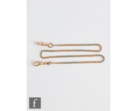An early 20th Century 9ct rose and white gold fine curb link Albert chain terminating in end swivels, length 38cm, weight 10.
