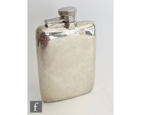 A hallmarked silver cushioned rectangular hip flask of plain form terminating in bayonet cap, length 12cm, Birmingham 1917. 