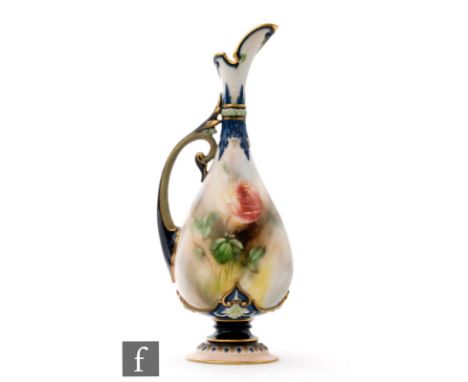A late 19th Century Hadleys Worcester pedestal ewer decorated with single rose buds and foliage with green and blue moulded b