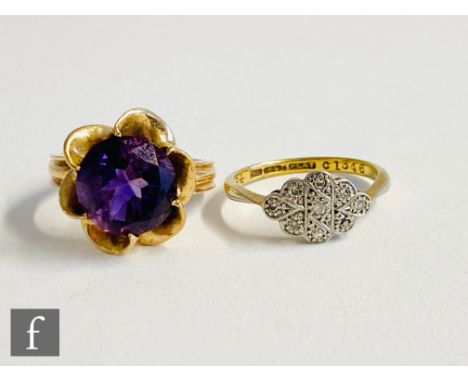 A 14ct single stone amethyst ring, claw set circular cut stone  to reeded shoulders, weight 6.3g, with an 18ct illusion set r