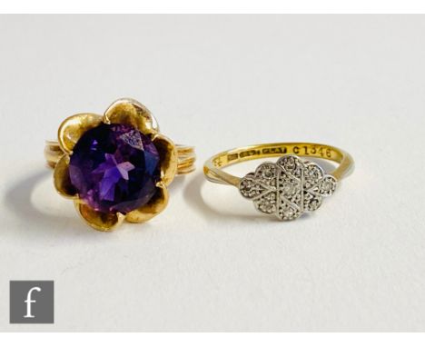 A 14ct single stone amethyst ring, claw set circular cut stone  to reeded shoulders, weight 6.3g, with an 18ct illusion set r