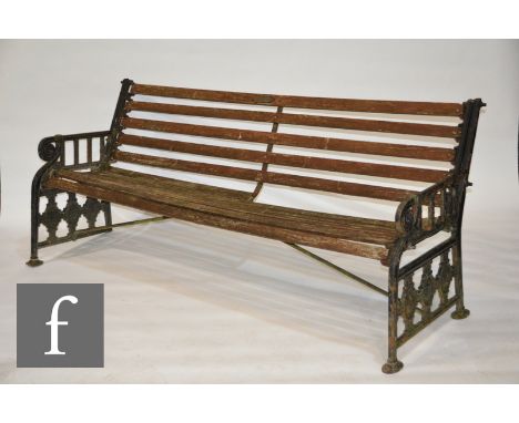 A pair of late 19th Century cast iron garden bench ends attributed to Coalbrookdale, after the 'Oval' pattern designed by Dr 