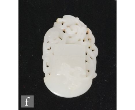 A Chinese white Jade pebble carving, Qing Dynasty (1644-1911), the pale green/white stone, with slight russet inclusions, of 