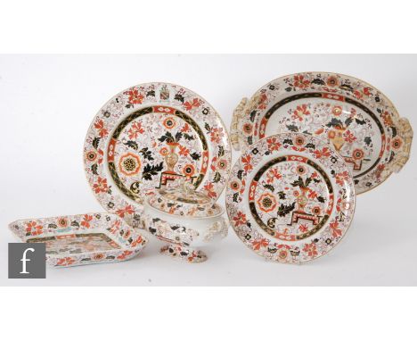 A collection of 19th Century Ashworth Ironstone dinner wares decorated in a gilt Imari palette with stylised Chinoiserie flow