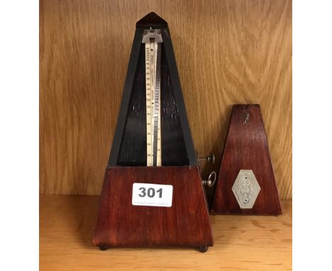 A vintage metronome.