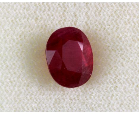 An un-mounted oval cut ruby (approx. 4ct).