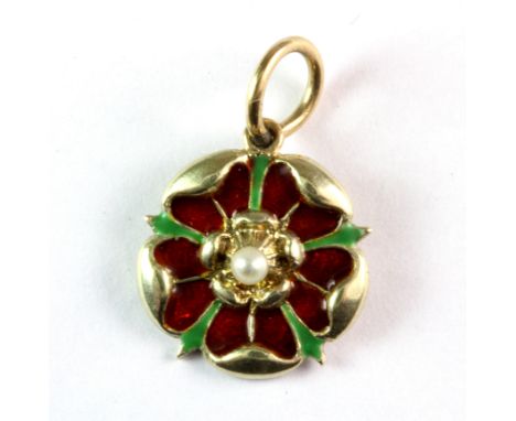 A 9ct yellow gold enamel and seed pearl set pendant, Dia. 1cm.