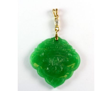 A beautiful yellow metal (tested minimum 9ct gold) mounted Chinese carved jade pendant set with a marquise cut diamond on the