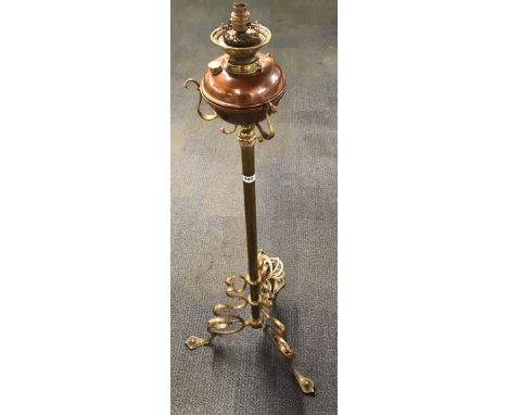 A 19th century Art Nouveau brass oil lamp stand converted to be used with electricity, H. 143cm.