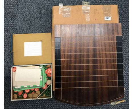 A mahogany shove ha'penny board and Chad Valley lotto.