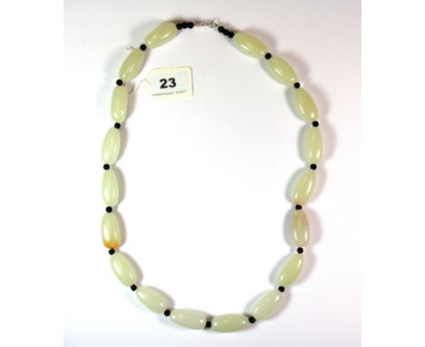 A Chinese white jade / hardstone pebble necklace, L. 80cm.